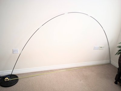 A photo of a tent pole being bent.
